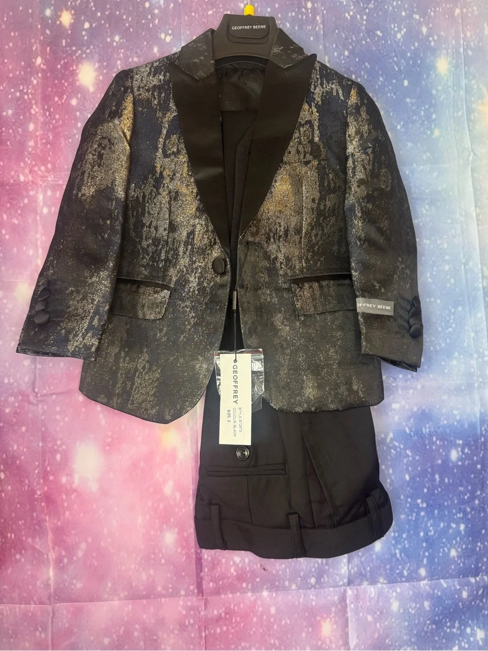 Geoffrey Beene boy's sparkle tuxedo jacket in black and gold with black pants